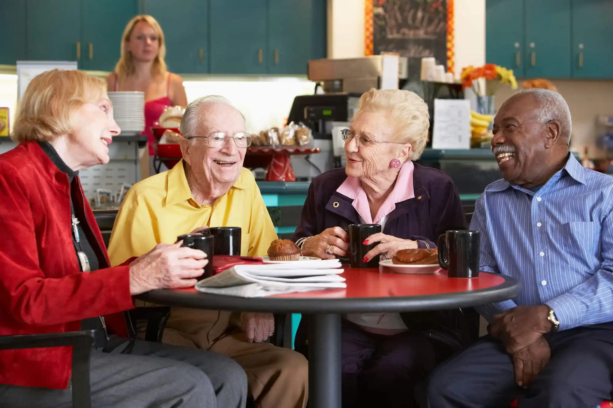 Group of seniors having a coffee
